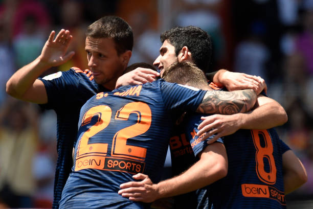 战术复盘:瓜迪奥拉与克洛普的欧冠首回合斗法